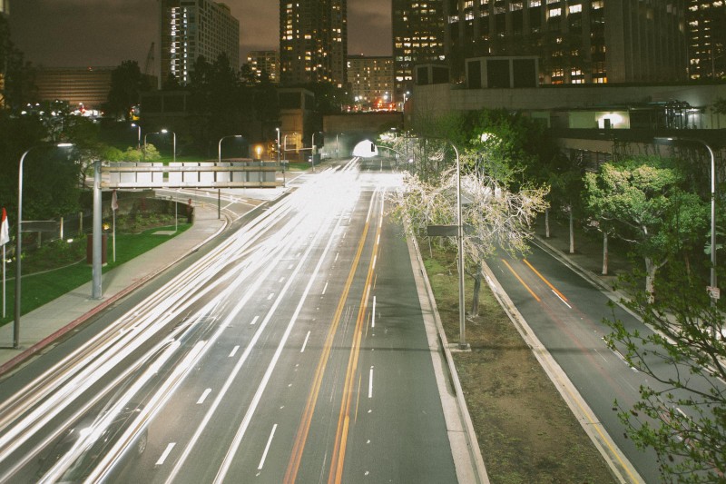 Long exposure photo of cars in a city