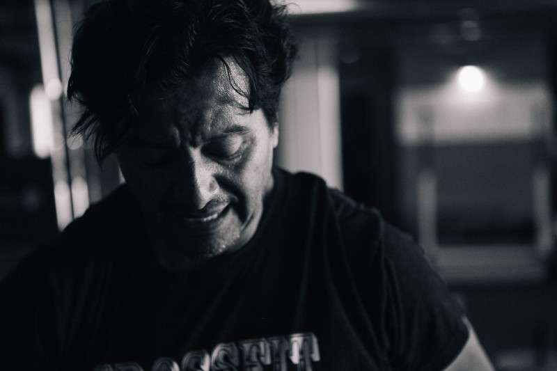 A photo of a man working hard